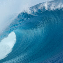 Blue ocean wave crashing down