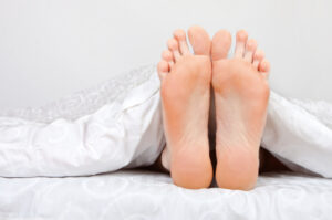 Sleeping - feet in bed