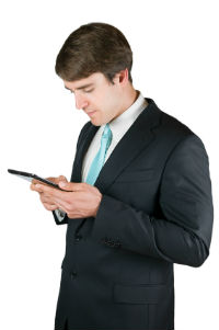 Man concentrating on tablet computer