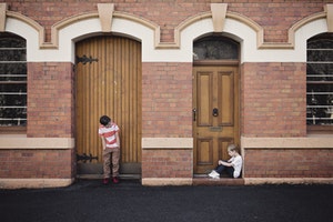Young boys in doorways