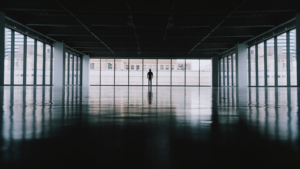 Man in hallway by Chen Liu